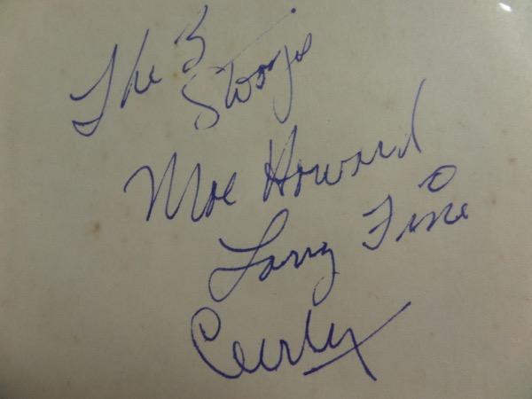 This off white-colored page was nicely removed from a vintage autograph book, measuring approximately 4x5" with rounded corners on the right.  It is blue ink-signed by all three original Stooges, including Moe Howard, Larry Fine and Curly Howard, all grading 7's.  A fabulous collector's item from three long-deceased comedy stars, valued into the low thousands!