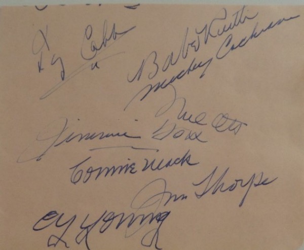 This full 4x5 autograph album page is still in EX condition, and comes hand-signed in blue by no less than 8 all time greats of the game.  Included are Ruth, Cobb, Mack, Ott, Foxx, Cy Young, Cochrane and even Jim Thorpe, and with all 8 men long-deceased, this unique collector's piece is valued well into the thousands!