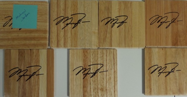 This fantastic grouping is SEVEN wooden floor boards, each measuring 6x6 in size, and each in NM/MT condition.  Each is hand-signed in black sharpie by the NBA all time great and Bulls HOF'er himself, and each can easily retail well into the hundreds by itself!