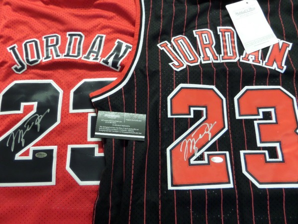 This savvy investment lot is TWO signed Jordan jersey for one bid, and both come tagged right, and feature sewn on everything. Great chance, both signed at celeb golf tourneys in perfect silver, and both come certed and hologrammed for life by numbered InPerson Authentics. Wow..Huge value, thousands for sure...