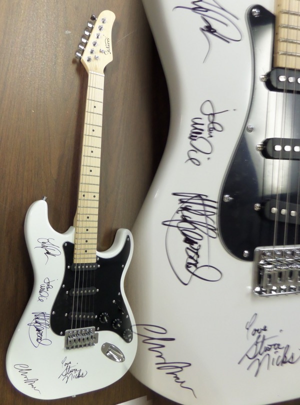 This GORGEOUS mint electric guitar is great-looking, and comes signed by ALL 5 legends from this history-making band in gorgeous silver sharpies! Included are MICK, STEVIE, LINDSEY, JOHN, & CHRISSY!!!  Very rare and comes with case, straps, cords,etc. in original box. Retails well into the low thousands easily and displays perfectly and ideal for the Rock collector.