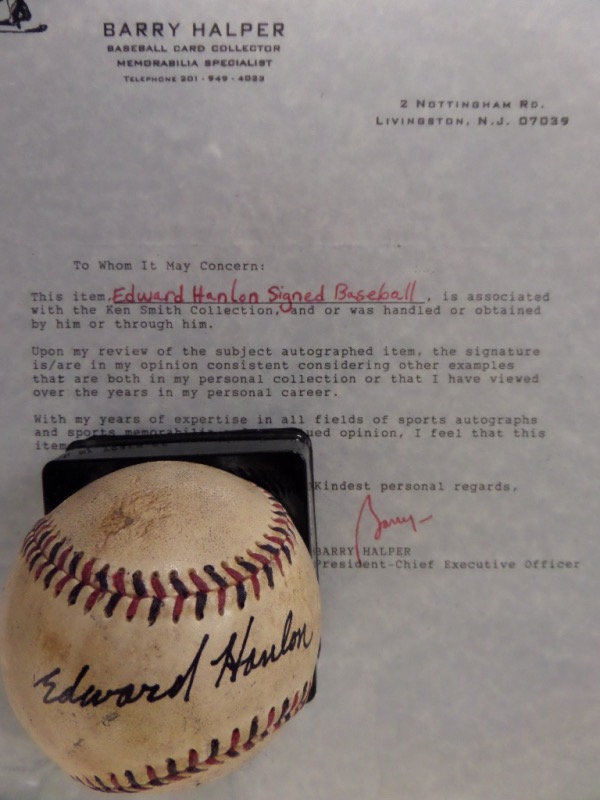 This black and red-laced, vintage baseball is still in G+/VG shape, and comes hand-signed in black across the sweet spot by legendary 1890's Baltimore Orioles Manager, Ned Hanlon.  The signature reads Edward Hanlon, grades a strong 8 overall, and is authenticated by Barry Halper for your assurance.  Valued into the low thousands!