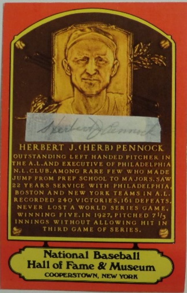 This outstanding item of Yankees lore is a RED Herb Pennock National Baseball Hall of Fame plaque postcard, in EX overall condition, and affixed with a small cut of white paper.  This cut bears the autograph of the HOF lefty hurler, grading a 5-6, and retail is high hundreds on this RARITY!