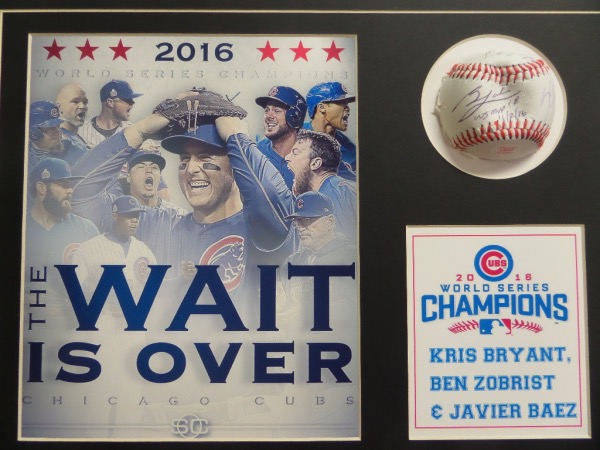 This 12x16 professionally-matted display features a 2016 Cubs World Champions photo print and a baseball half, hand-signed by three stars that brought the Series back to Chicago.  Included are WS MVP Ben Zobrist, regular season MVP Kris Bryant, and NLCS MVP Javier Baez.  AWESOME piece to remember 2016 in Chicago, ready for your framing touch, and retail is mid/high hundreds!