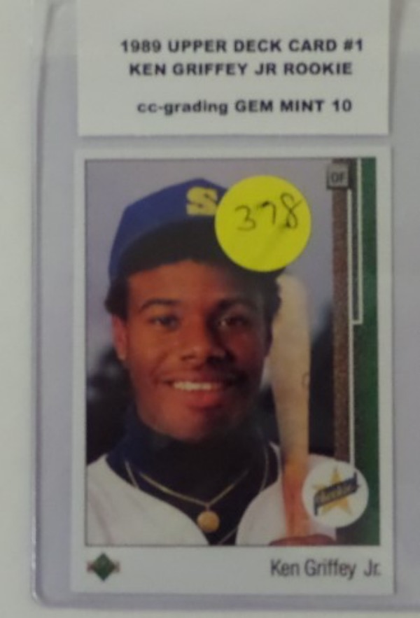 This Hall of Famer Ken Griffey Jr ROOKIE card #1 from the 1989 Upper Deck set comes graded GEM MINT 10 by CC-GRADING and deserves the grade as the card is centered and no flaws. Great card valued in the HIGH Hundreds in this condition and a MUST for the HOF'er ROOKIE card and sure to climb in value.