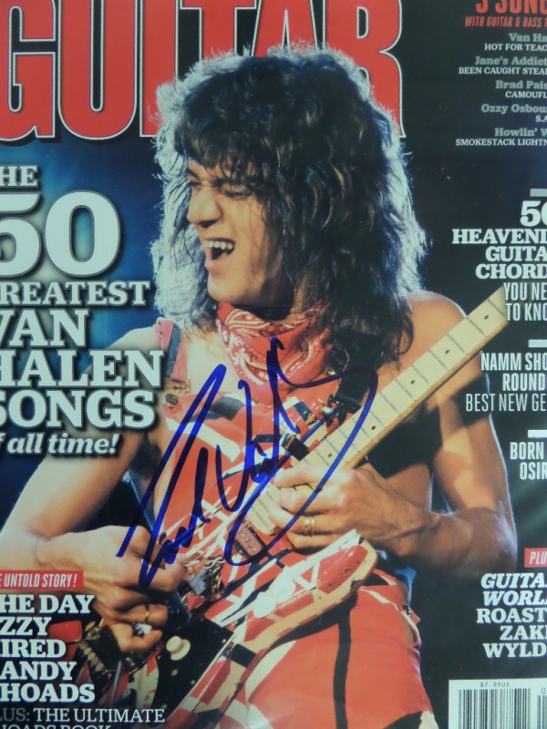 This April 2012 full issue of Guitar World is still in EX/MT condition, with a great color concert image of Eddie Van Halen on the front cover.  It is hand-signed in blue sharpie by the all time virtuoso himself, grading a legible 8.5-9, and with his recent passing, retail is mid hundreds!