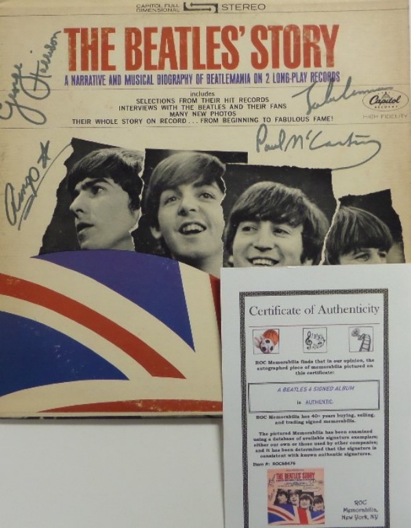 This original Capitol Records release of the "The Beatles Story" LP album is in EX overall condition, and comes front cover-signed in black felt tip marker by all four band members.  Included are Paul McCartney, George Harrison (dec), John Lennon (dec) and Ringo Starr and with all four autographs present, this should make for a true jewel for any Beatles collection!  ROC Memorabilia photo COA included for authenticity purposes!