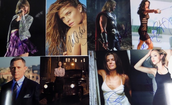 This fine grouping is FIFTY different 8x10 of celebrities, each hand-signed by the star(s) pictured.  Included are Taylor Swift, Lucy Liu, Amanda Seyfried, Ryan Reynolds, Sandra Bullock, Elizabeth Olsen, Catherine Zeta Jones, Daniel Craig, Chris Hemsworth, Krysten Ritter, Mila Kunis, Carmen Electra, Denise Richards, Elizabeth Banks, Jessica Chastain, Zooey Deschenel, Kate Bosworth, Selena Gomez, Uma Thurman, Tina Fey, Allison Brie, Michael Douglas, Avril Lavigne, Pam Anderson, Leslie Mann, Nic Cage and many more.  A great opportunity here, and retail is well into the thousands!