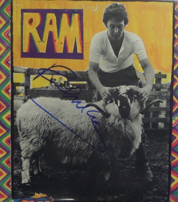 This "RAM" LP album from Paul McCartney is from 1971, and comes to us in EX/EX+ overall condition.  It is hand-signed on the front cover in blue sharpie by Sir Paul himself, grading a clean 8.5 overall, and with Paul now in his 80's and harder to get to than the President, retail is high hundreds!