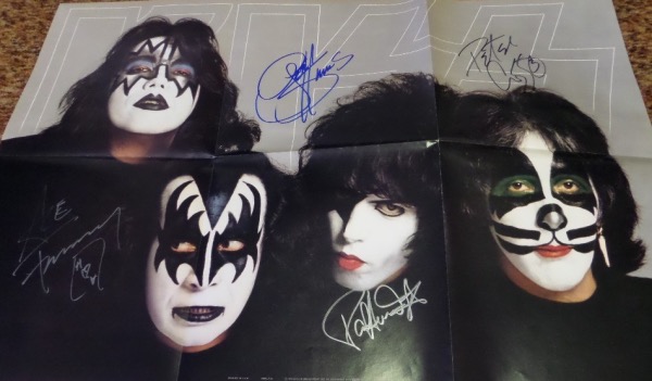 This 2'x3' color poster is nearly folded so there are some creases (most be pulled out once framed) and it shows the original 4 guys in makeup. It comes signed by ALL 4 of them wonderfully in various colors. Ideal for framing and retails in the mid hundreds. 