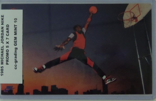 This 4 x 6 NIKE Promo Card of Michael Jordan from 1985 shows him flying thru the air ready to dunk. This is his RARE AIR card that comes Slabbed and Graded GEM MINT 10 by CC Grading, and has sold for well over $1000 in a less grade then this beauty.