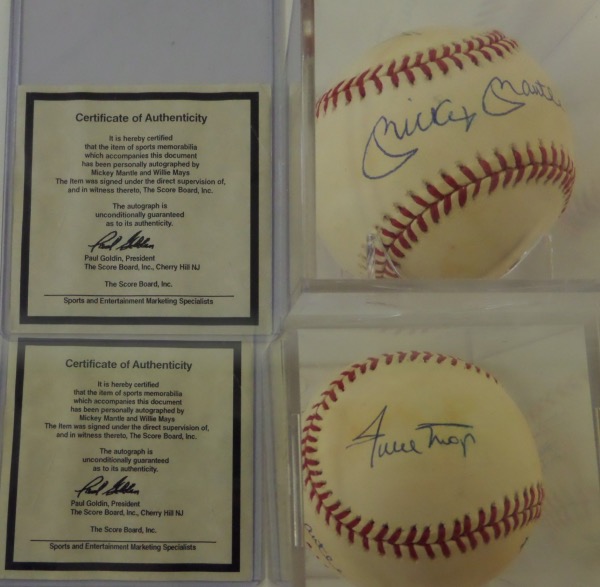 This Official National League Baseball (Giamatti, Pres) from Rawlings is still in VG+ overall condition, and comes hand-signed in blue ink by two of the greatest players of all time.  Included are Mickey Mantle across the sweet spot and Willie Mays on the top panel, with signatures grading roughly 8's each, and the ball includes a COA from The Score Board for rock solid authenticity.  Valued into the very high hundreds!