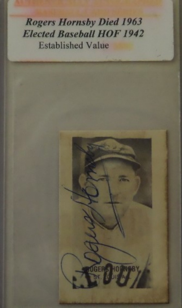 This very old black and white strip type card of Rogers Hornsby shows him with the Browns, dating the card from the mid 1930's.  It is hand-signed in blue ink by the lifetime .358 hitter and 2 time Triple Crown winner himself, and retail is mid/high hundreds!