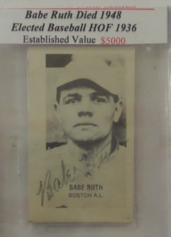 This very old black and white baseball card shows a very young Babe Ruth as a member of the Boston Red Sox.  It is in EX overall condition, and comes hand-signed in what looks like pencil by The Bambino himself.  The signature grades a lighter but legible 5-5.5, and retail on this card is low thousands!