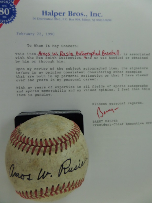 This vintage, red-laced baseball is in G+/VG condition, and comes hand-signed in blue across the sweet spot by "The Hoosier Thunderbolt," himself, Hall Of Fame New York Giants flamethrower, Amos Rusie.  The signature is a nice example, reading Amos W. Rusie, with a grade of 7 in order, and the ball comes with a full LOA from Halper Bros., Inc. for authenticity purposes.  Valued well into the thousands!
