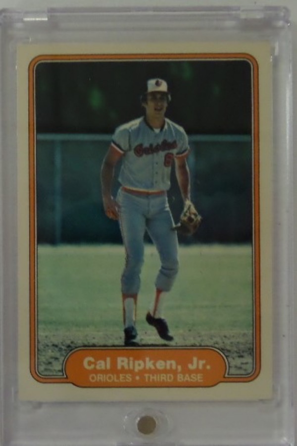 This ROOKIE card #176 from the 1982 Fleer set is the ROOKIE card of Cal Ripken Jr, and comes to us slabbed in what I can only described as pristine condition.  The edges and corners are razor sharp and centering is hard to call anything but perfect--but you can see our picture for yourself. Great value here with a Value of $650 at least!