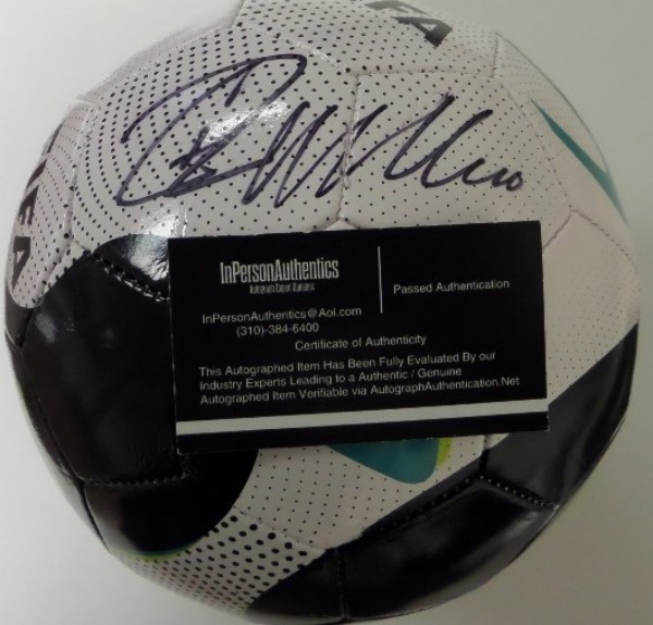 This mint leather soccer ball is from FIFA and comes boldly black marker signed by the International soccer star. It grades a clean bold 10 all over, has the sought after InPerson Authentics lifetime COA intact, and value is ? 