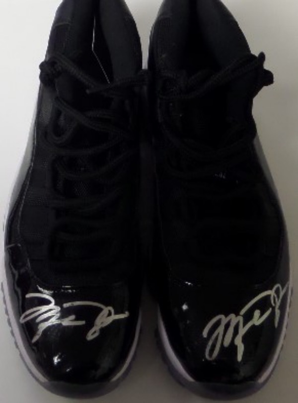 This super easy resale lot is a pair of his Nike black sneaks, and each one comes toe signed in bold silver paint pen. They grade clean bold 10s all over, and even have the InPerson Authentics lifetime COA and added hologram for iron clad certainty intact. High value, yet no reserve ever here at the "Corner".