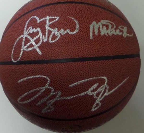 This NM full size All Surface Basketball from Spalding comes hand-signed in bright silver by the three most high profile Dream Team members.  Included are Magic Johnson and Larry Bird on one panel, and Michael Jordan on the panel directly below, and all of the signatures grade 8's or better.  A fantastic display ball and conversation piece, and retail is well into the low thousands, but we're gonna start the bidding with a SONG!!!