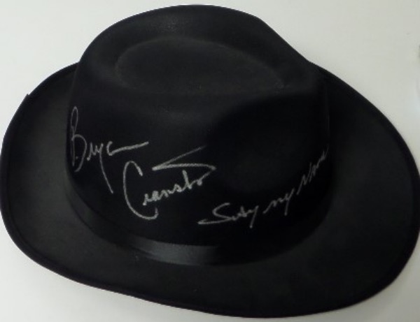 This black fedora hat is similar to the type worn by Bryan Cranston in "Breaking Bad" as Walter White.  This one is in EX overall condition, and comes hand-signed by "Heizenberg" himself, award-winning actor, Bryan Cranston.  This is a very strong silver sharpie signature, grading an 8.5 at least with a super cool Say My Name! inscription.  If you're a television collector or dealer, then you know you simply cannot get a cooler conversation piece than this.  Valued into the very high hundreds to low thousands!