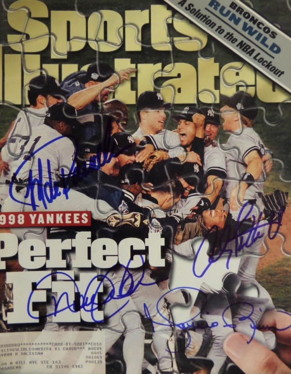 This full issue of Sports Illustrated is from November 2, 1998, and shows the NY Yankees celebrating their 25th World Series title.  It is hand-signed in blue sharpie by the four longtime Yankees stars known as the "Core Four," Derek Jeter, Andy Pettitte, Jorge Posada, and Mariano Rivera.  With half in the HOF, and a good chance for the other half, retail is high hundreds!
