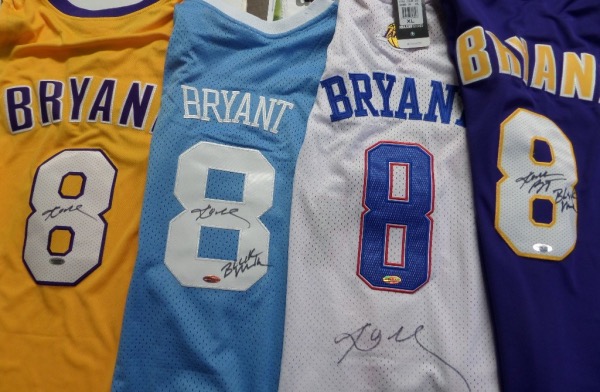 This dealer lot is AMAZING and includes 4 different authentic-style and mint Kobe jerseys. Each comes signed perfectly on the back by this deceased legend with 2 of them including "Black Mamba"!  Each comes hologrammed by InPersonAuthentics and included are gold Lakers, blue throwback Lakers, All Star, & purple Lakers! Wow!
