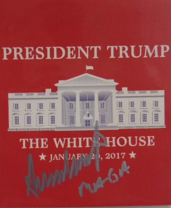 This red President Trump The White House January 20, 2017 Inauguration card measures 3.5x4 and is in NM/MT condition.  It is hand-signed in SILVER by #45 himself, and grades a strong 8, with a MAGA inscription added.  Small in stature, but packs a powerful, political punch, and retail is high hundreds, at least!