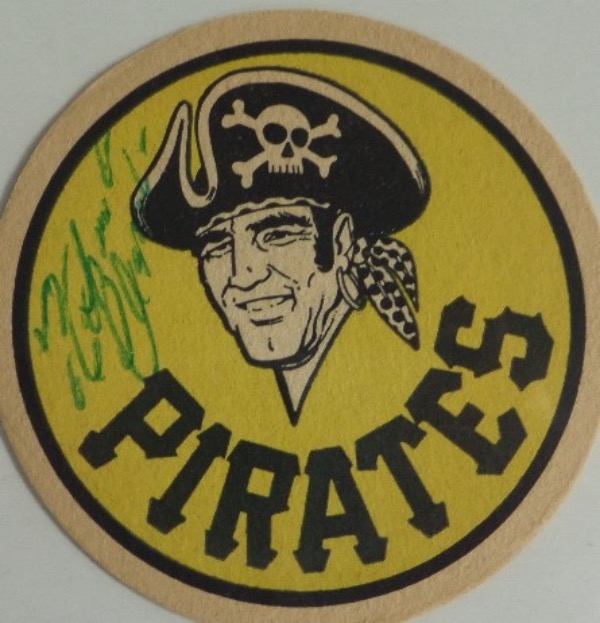 This 3.5" diameter Pittsburgh Pirates team logo drink coaster from Iron City Beer is still in EX shape overall, and comes hand-signed in green ink by their most famous HOF'er, all time great outfielder, Roberto Clemente.  The signature grades about a 6 overall, and with Clemente's death now a half century ago, retail is low thousands!