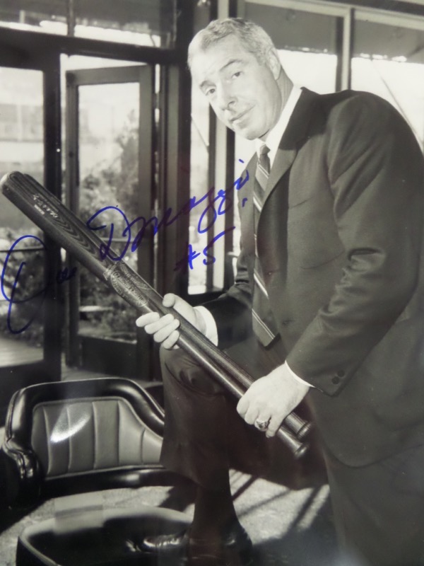 This rare and seldom-seen image shows an aging Joe in a suit and tie and holding a few bats! Signed wonderfully in blue with his #5 included!  In EX shape overall and ideal for framing and retails in the mid hundreds. 