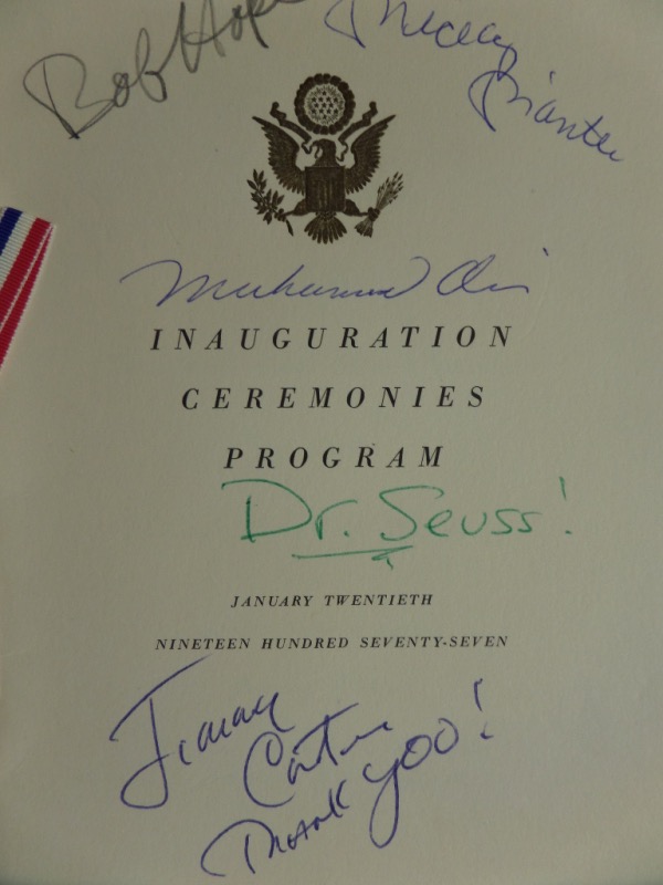 This original 1977 Inauguration Ceremonies Program is still in EX/MT shape, with a red white and blue ribbon on the left.  It is penned in blue ink by 39th US President, Jimmy Carter, but also by four larger than life American Icons!  Included are Mickey Mantle, Dr. Seuss, Muhammad Ali and Bob Hope.  Can you imagine if they were all there?  Valued well into the thousands!