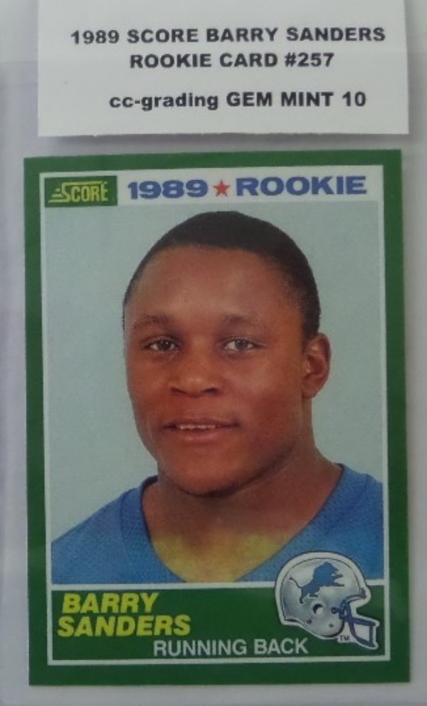 This ROOKIE card of Barry Sanders is from 1989 Score and numbered #257 and graded by CC-Grading at a Gorgeous GEM MINT 10. This is a real investment card from this Great Hall of Famer and well valued by PSA online price guide at $1300.