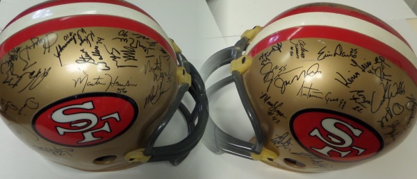 This IN PERSON obtained, team hotel Super Bowl acquisition is a team signed helmet from their big Super Bowl win, and has stellar names as signers like Rice, Montana, Merton Hanks etc. It grades a cleanish 8.5 all over, and value is $1500.00 on the impossible NFL Super Bowl item. 