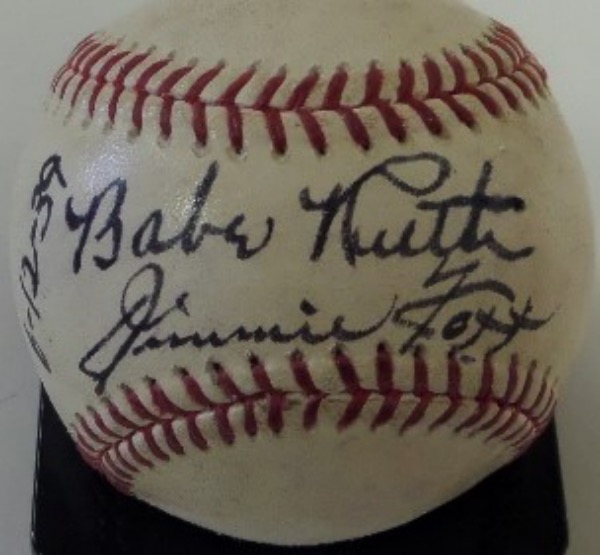 This unique offering is a red-laced vintage baseball, still in VG/VG+ condition after all these years.  And we know how long it's been, because this ball is dated from the Hall of Fame opening of 6-12-39, and signed on the sweet spot in black by this pair of 500 home run hitting legends!  Included are both Babe Ruth and Jimmie Foxx, both on the sweet spot, both bold and clean 7's or better, and with both men gone a very long time, retail is well into the five figure range, but we're starting the bidding at ... wait ... WHAT?!?!?!?