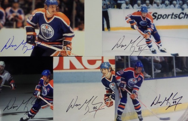 This outstanding group lot is FIVE different full color photos, all of Wayne Gretzky in NHL action with the Edmonton Oilers, and each of which comes hand-signed by The Great One himself.  Valued well into the hundreds!