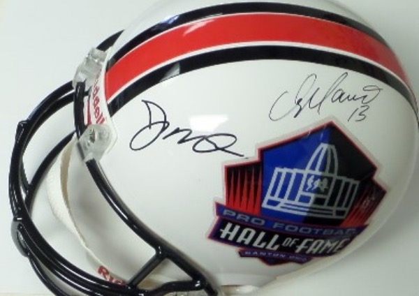 This full size Pro Football Hall of Fame logo replica helmet from Riddell is in NM condition, and comes black sharpie-signed by two of the greatest quarterbacks in NFL history.  Included are Joe Montana and Dan Marino, both on the same side for display, with each grading a legible 8 or better, and retail is high hundreds on this beauty!