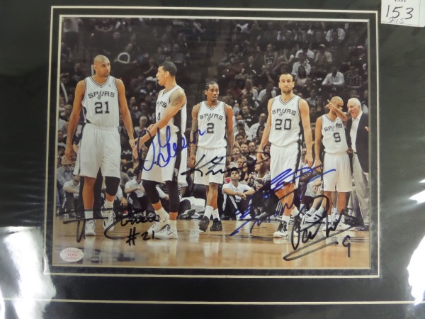 This 12x16 professionally-matted display features large color photo print that is hand-signed in black or blue sharpie by five key members of this year's NBA Title holders.  Included are Kawhi Leonard, Danny Green, and future Hall Of Fame stars Tim Duncan, Manu Ginobili and Tony Parker.  Ready for framing, and valued into the mid hundreds!