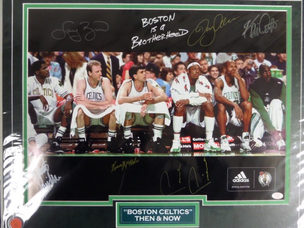 This gorgeous, large color 16x20 matted display features a photo collage entitled "Boston Celtics: then & Now", comes hand signed in gold/silver sharpie by BOTH sets of the Celtics' "Big Three"s!  Included are Larry Bird, Kevin McHale, Robert Parish, Paul Pierce, Ray Allen and Kevin Garnett and the retail potential here is easily into the mid/high hundreds!