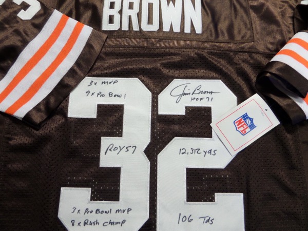 This brown size 50 custom 1964 throwback Cleveland Browns #32 Jim Brown jersey from Mitchell & Ness is tagged as NEW, and comes with everything custom hand-sewn.  It is back number-signed in black sharpie by the greatest running back EVER, including 3X MVP, HOF71, ROY 57, 8X Rushing Champ, 9X Pro Bowl, 3X Pro Bowl MVP, 12,312 yds, and 106 Rushing TDs inscriptions!  Now THAT'S a rarity from the all time great, now deceased, and the retail value of this jersey is high hundreds, and might even touch low thousands!