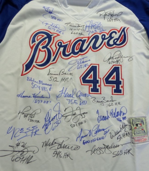 This Hank Aaron #44 custom white size L throwback Braves jersey from Mitchell & Ness is in NM condition, and has everything nicely sewn.  It comes front-signed by no less than TWENTY-THREE different members of the famed 500 Home Run Club, including Murray, Schmidt, Mays, Killebrew, Robinson, Sheffield, McGwire, ARod, Griffey Jr, Thome, Manny, McCovey, Reggie, Cabrera, Banks, Palmiero, Ortiz, Sosa, Pujols, Bonds, Thomas and even Aaron himself!  What a fabulous jersey, and with 4 of the 22 now deceased, retail is into the low thousands!