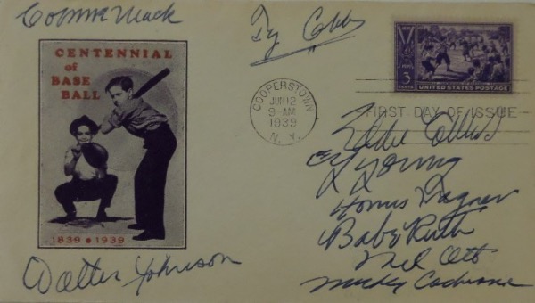 This AWESOME and historic MLB item is an original First Day of Issue Baseball Centennial cachet, stamped from June 12, 1939, and in fabulous condition.  It is had-signed in blue ink by no less than 9 legends of the game, including Cobb, Mack, Ott, Ruth, Collins, Johnson, Wagner, Young and Cochrane, and it is valued well into the significant thousands!