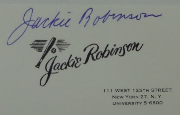 This vintage Jackie Robinson business card is in NM condition, and comes hand signed in blue ball point pen ink by the great Brooklyn Dodgers HOF'er and pioneer.  His signature is very clean, grading a legible 8, and will make for a wonderful display on one of his very own business cards.  Valued into the high hundreds!