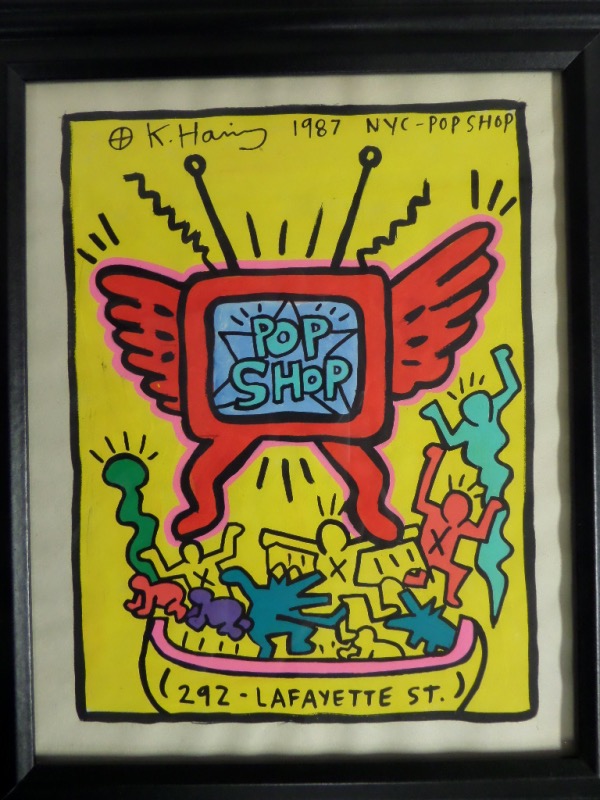 Google this guy, then bid accordingly. He was a 1980-90's famous NYC pop artist, and his works sell for a ton! This one is framed in black, ready to hang, and about 10x12 in size. It shows a colorful scene with people and comes signed and dated from 1987 by Haring. It is EZ on the eyes, and valued at many times our asking price. Lots of yellow and red colors in here, and one of my favorites from the deceased artist. 