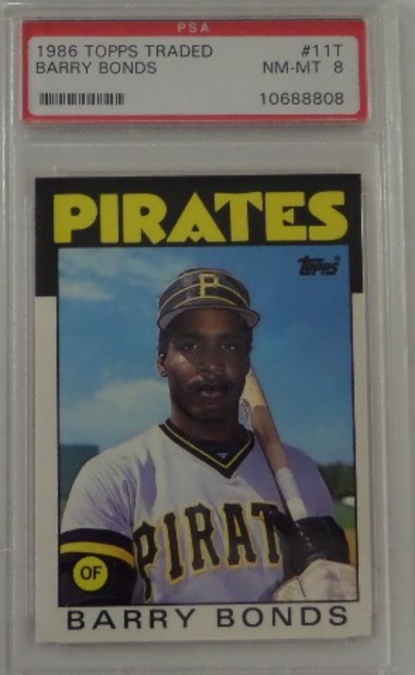 This ROOKIE card #11T from 1986 Topps Traded set is the Barry Bonds ROOKIE. The card comes slabbed and GRADED NM/MT 8 by PSA and is well valued at over $500 now that he is the Homerun King of Baseball, and soon to be Hall of Famer!!!!