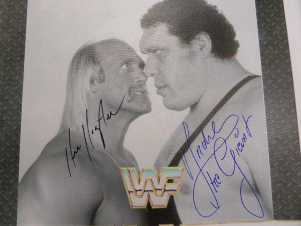 This ultimate wrestling item is an 18x22 real canvas work, shows two of the best all-time ring warriors squaring off before Wrestlemania, and comes hand signed by BOTH in bold black and blue sharpie. It grades a clean bold 10 all over, shows off well from 40 feet away, and with Lee's added approval, value soars into the thousands. 