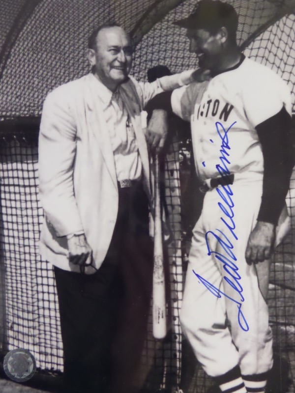 This very rare image is a B&W 8x10, shows Ted from 1950 or so talking baseball with HOF'er Ty Cobb, and comes blue sharpie signed up Ted's body. It grades a bold 10 all over, shows off well from 30 feet away, and when you add in lifetime forensic certification, well, you have an easy decision to make on this gem. 