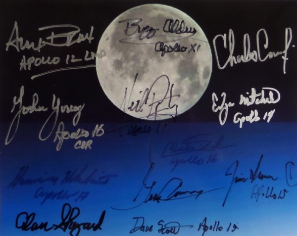 This color 8x10 photo shows the moon, and comes hand-signed by no less than 12 different astronauts.  Included are Neil Armstrong, Buzz Aldrin, Charles Conrad, Alan Bean, John Young, Jim Irwin, Alan Shepard, Dave Scott, Gene Cernan, and more, and retail is mid/high hundreds!