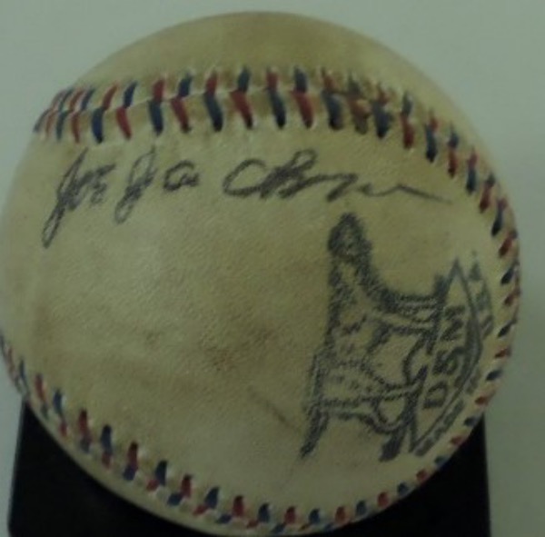 This well-worn, red and blue-laced Official Ball from D&M is in VG overall condition and shows quite a bit of age.  It features the side panel signature of "Shoeless" Joe himself, Joe Jackson, the black ink autograph grading a legible 5.5-6 or so.  With Jackson and his teammates World Series exploits now exactly a century ago, what better piece to commemorate the history?