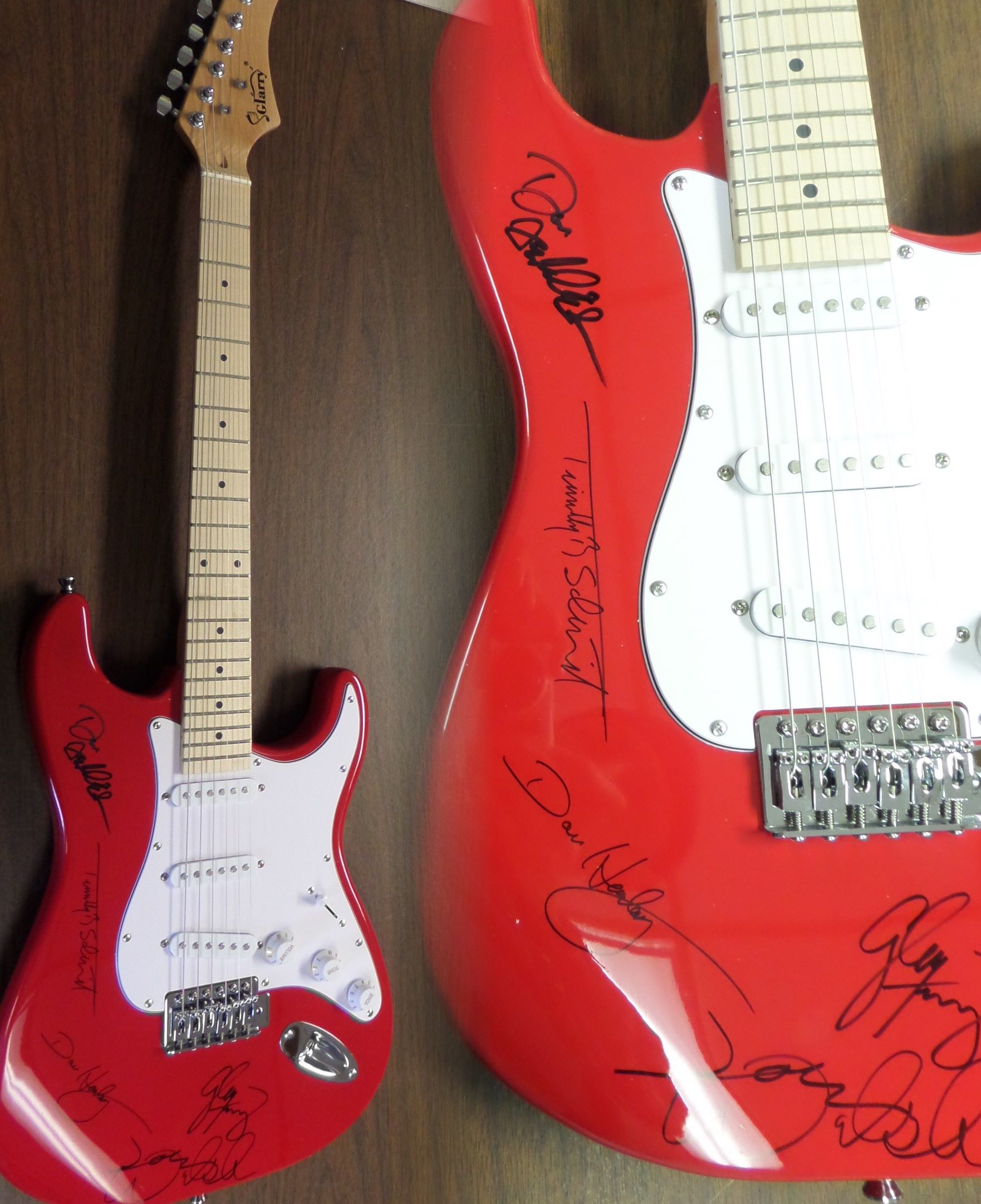 Wow, this mint and great-looking electric guitar comes signed 5 of the longtime members of this amazing rock band. The signatures all show off wonderfully on this gorgeous guitar and included are JOE WALSH, GLENN FREY (deceased), DON HENLEY, TIMOTHY SCHMIT, & DON FELDER!!  Very rare with Frey's signature and retails into the thousands easily. Guaranteed authentic. 