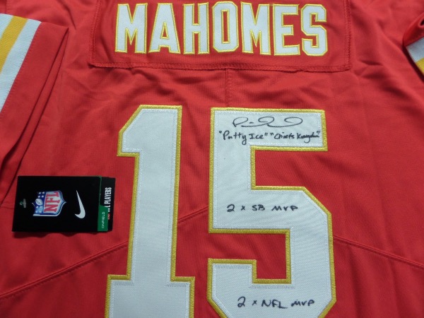 This red size L KC Chiefs jersey from NIke is still tagged as new, and comes trimmed in yellow and white, with everything sewn.  It is back number-signed in black sharpie by the NFL and Super Bowl MVP himself, complete with "Patty Ice," 2X SB MVP "Chiefs Kingdom," and 2X NFL MVP inscriptions, and is an ideal addition to any Chiefs collection.  Valued into the low thousands!