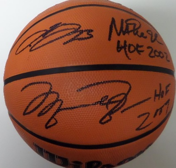 This full size basketball from Wilson is in NM/MT shape, and comes hand-signed in black sharpie by three of the most celebrated players in NBA history.  Included are LeBron James, Michael Jordan and Magic Johnson, with Magic and Jordan adding HOF years, and LeBron adding his number 23 as inscriptions.  Signatures are on adjacent panels for display value, and retail is low thousands!